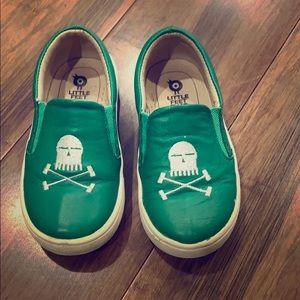 Green skull slip ons